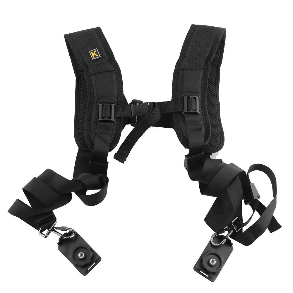 Black professional dual SLR camera strap with shoulder pads shown holding two cameras.