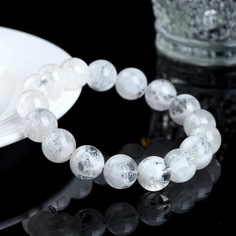 Women's crystal bracelet with natural blizzard snowflake round beads in geometric shape with Ruyi and Xiangyun design elements