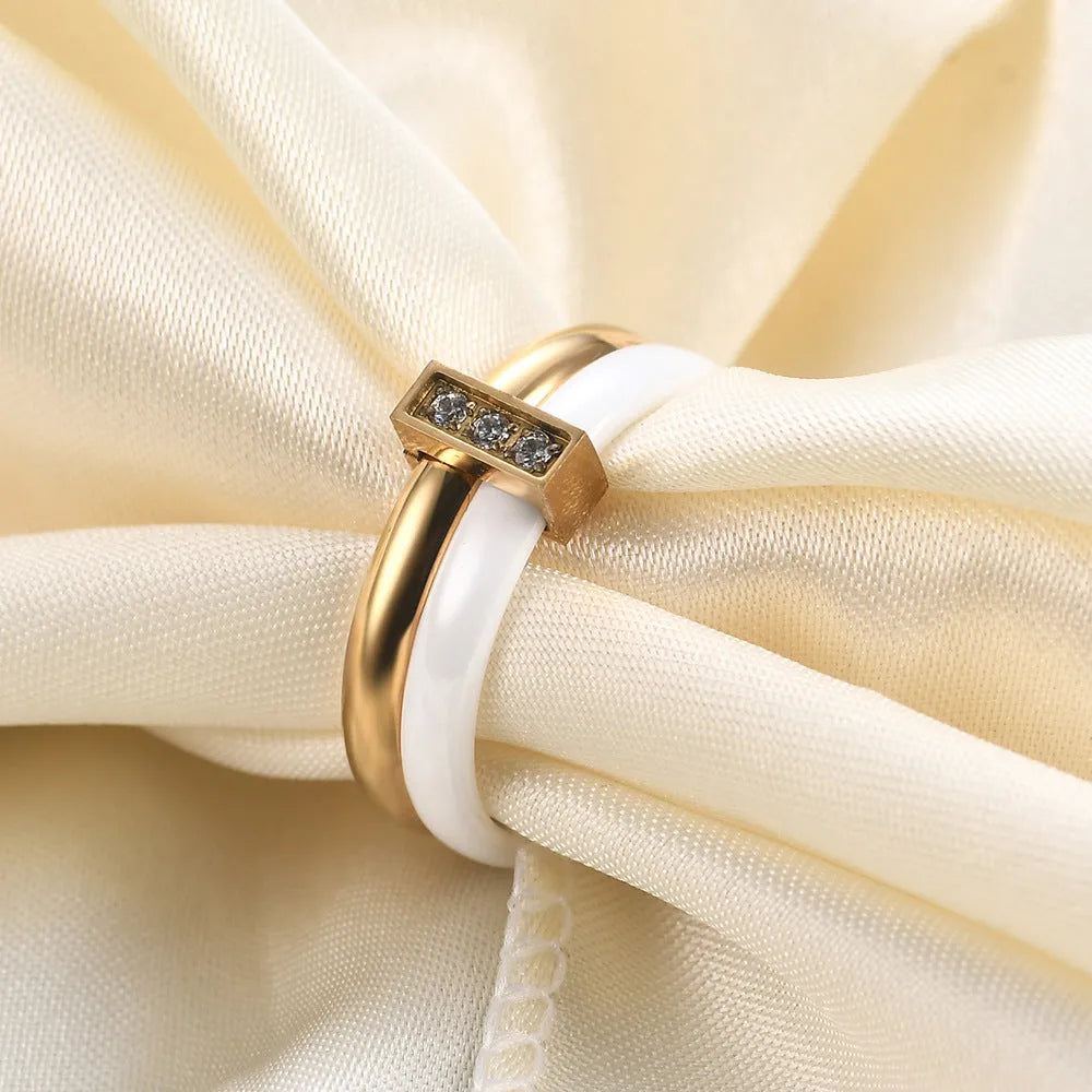 Ceramic women's ring with 6mm zirconium geometric centrepiece and glossy stitching in steel black or gold white