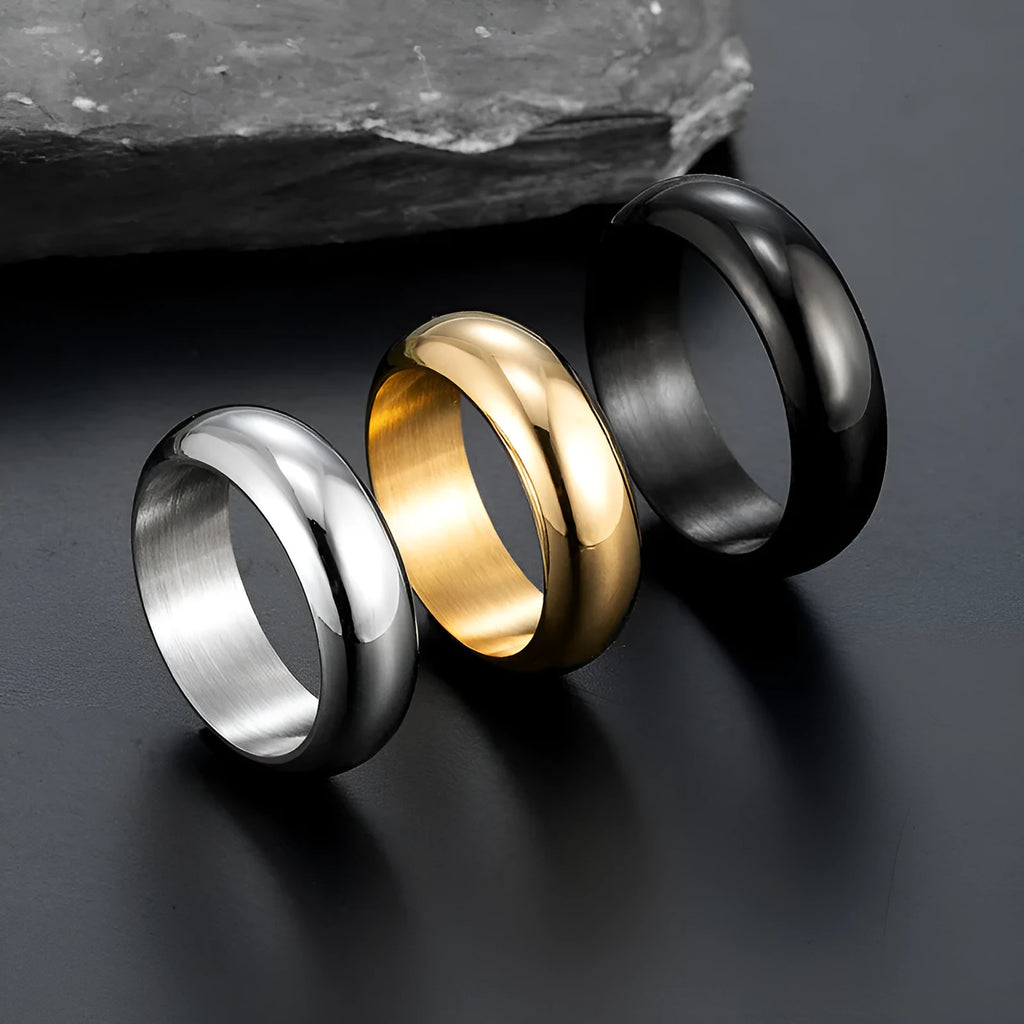 Glossy electroplated titanium steel ring shown in gold, black, and steel colour on a size chart from 7 to 12.