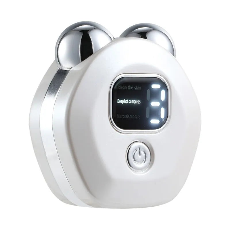 Portable white facial massage instrument with double-roller head for hot compress and micro current therapy.