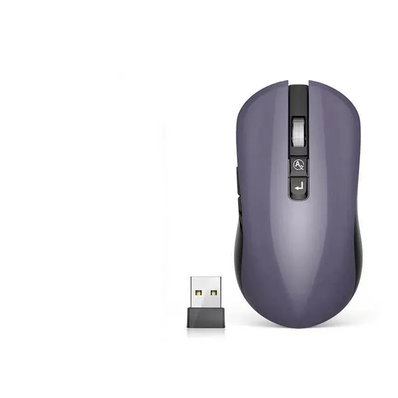IFLYTEK voice translation wireless gaming mouse on a desk, showing its seven keys and USB receiver.