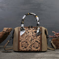 Vintage style leather messenger bag in horizontal square shape with multiple interior compartments