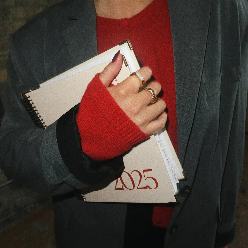Cherry red daily schedule coil notebook with spiral binding and A5 paper size