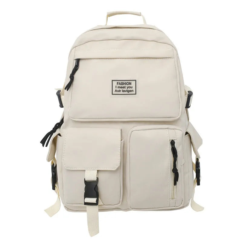 Soft nylon student backpack in black with a three-dimensional front pocket.