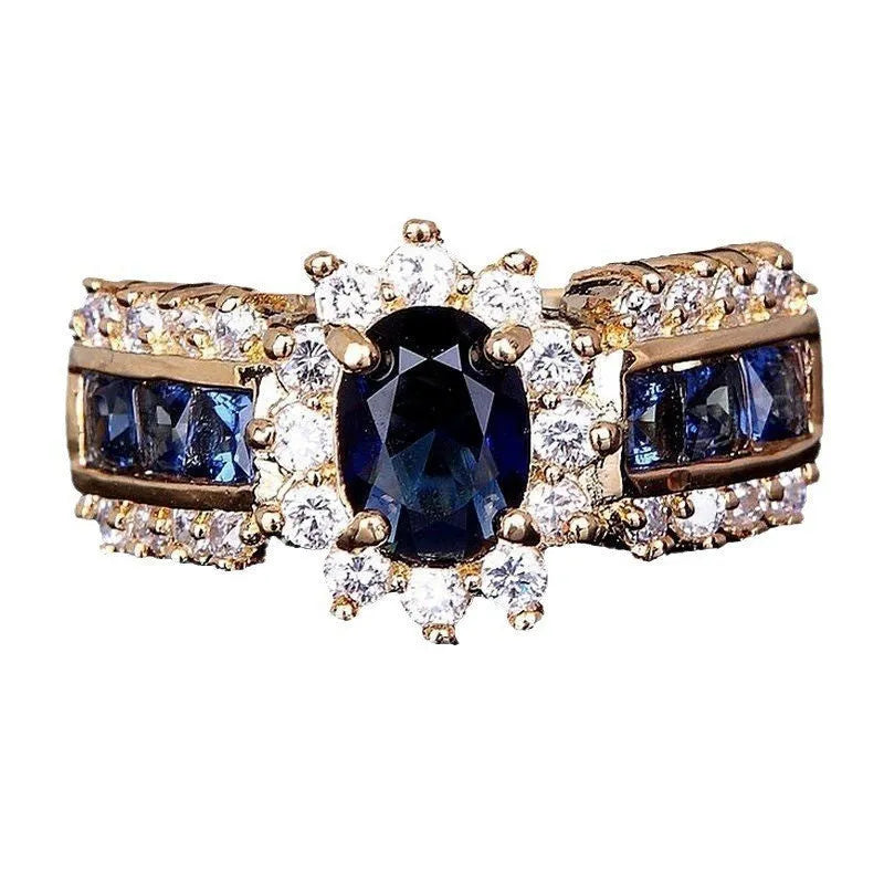 Personalised zinc alloy ring with blue diamond or coloured zircon designs in sizes 6 to 11.