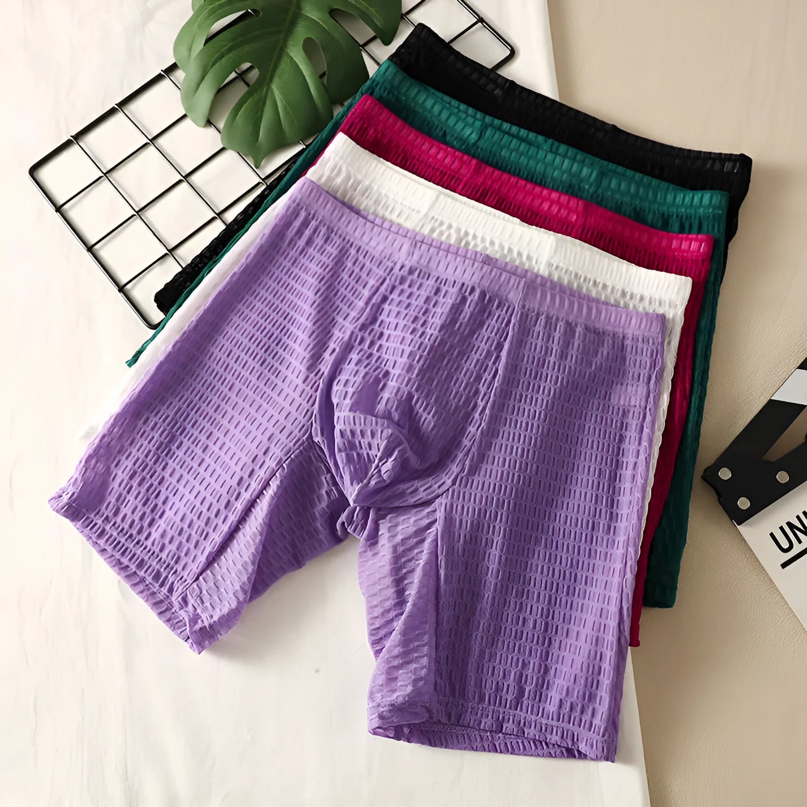 Men's lace boxer shorts in rose red colour showing shaping design
