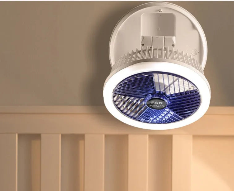Blue USB foldable table fan with LED night light, pen holder, and four speed settings on a desk