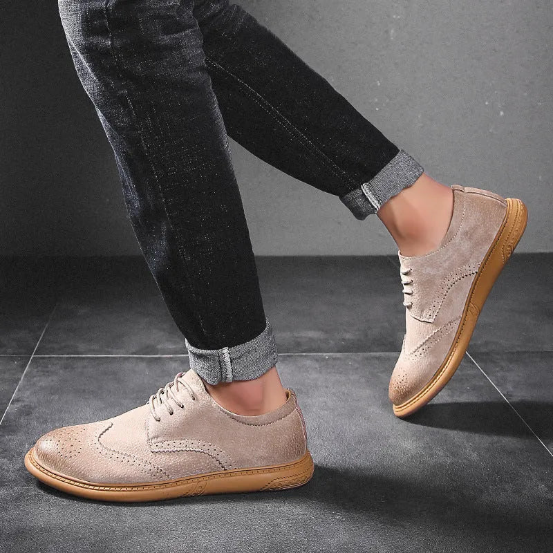 Men's black genuine leather low-top business shoes with lace-up front and rubber sole.