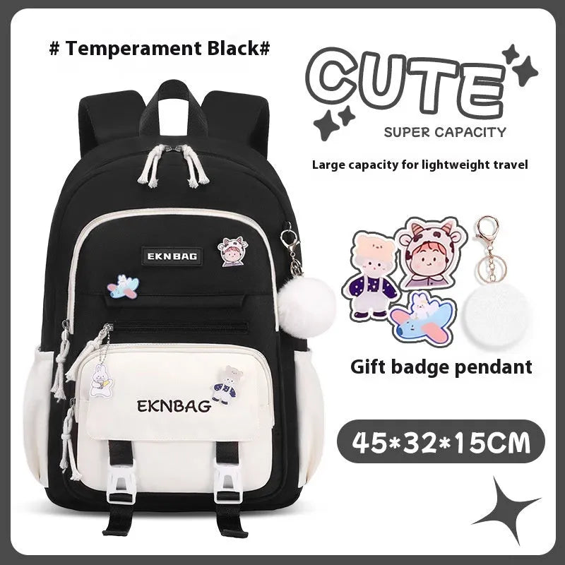 Girls' waterproof school backpack in Oxford cloth with curved shoulder straps, shown in a solid colour.