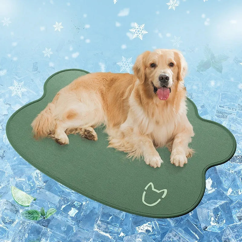 Ice silk dog cooling mat with dog head shaped design in light grey on a wooden floor.