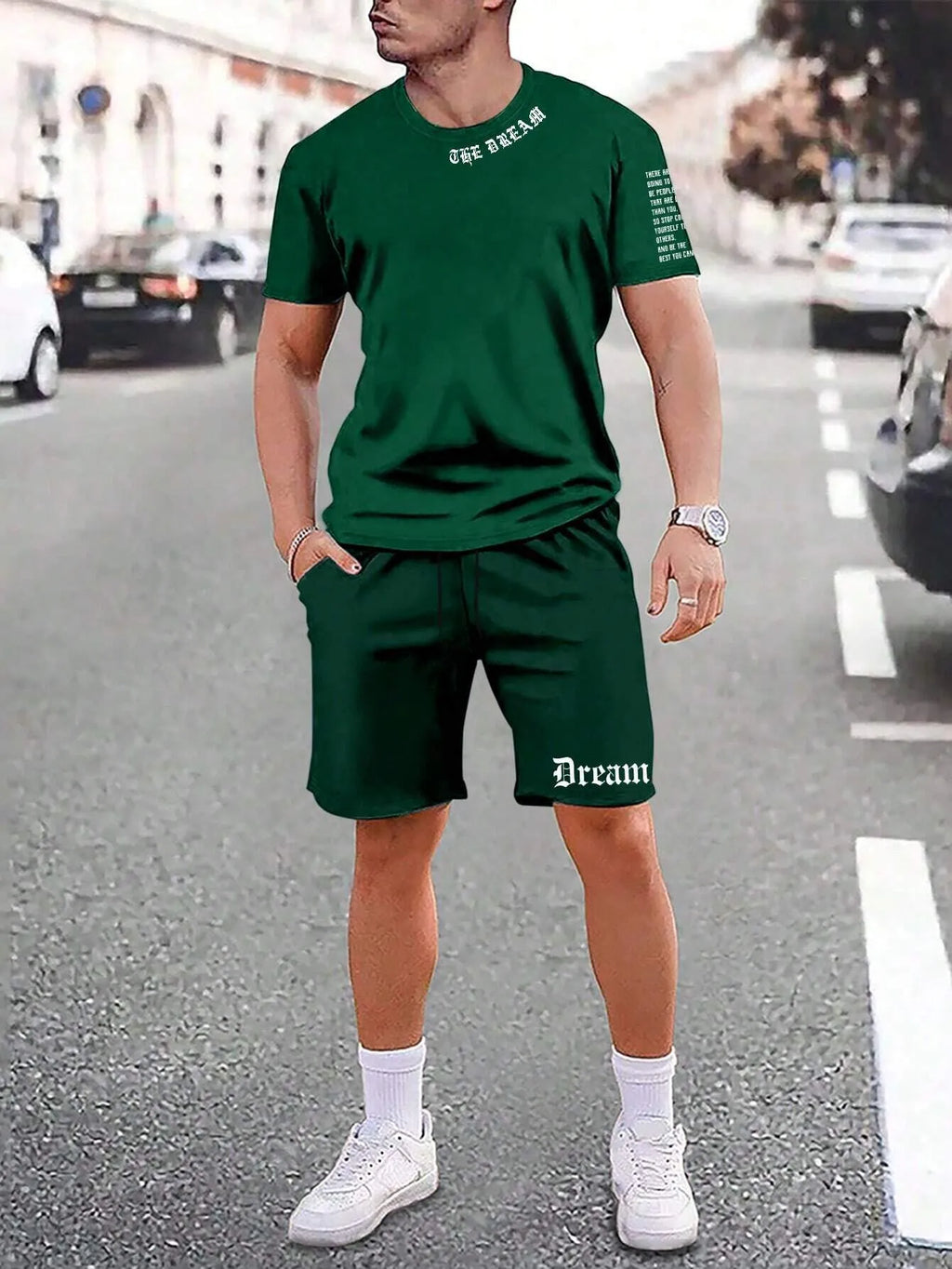 Men's navy blue printed short-sleeved top and matching shorts sports set on a white background