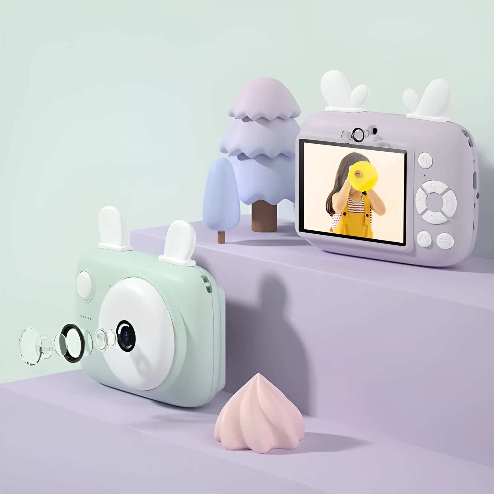 A2 kids digital camera in macaron colours with dual lenses, 2.4-inch screen, and included lanyard.