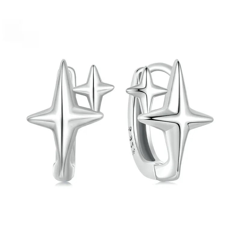 Sterling silver star clip earrings with oxidised finish and XINGX decorative elements