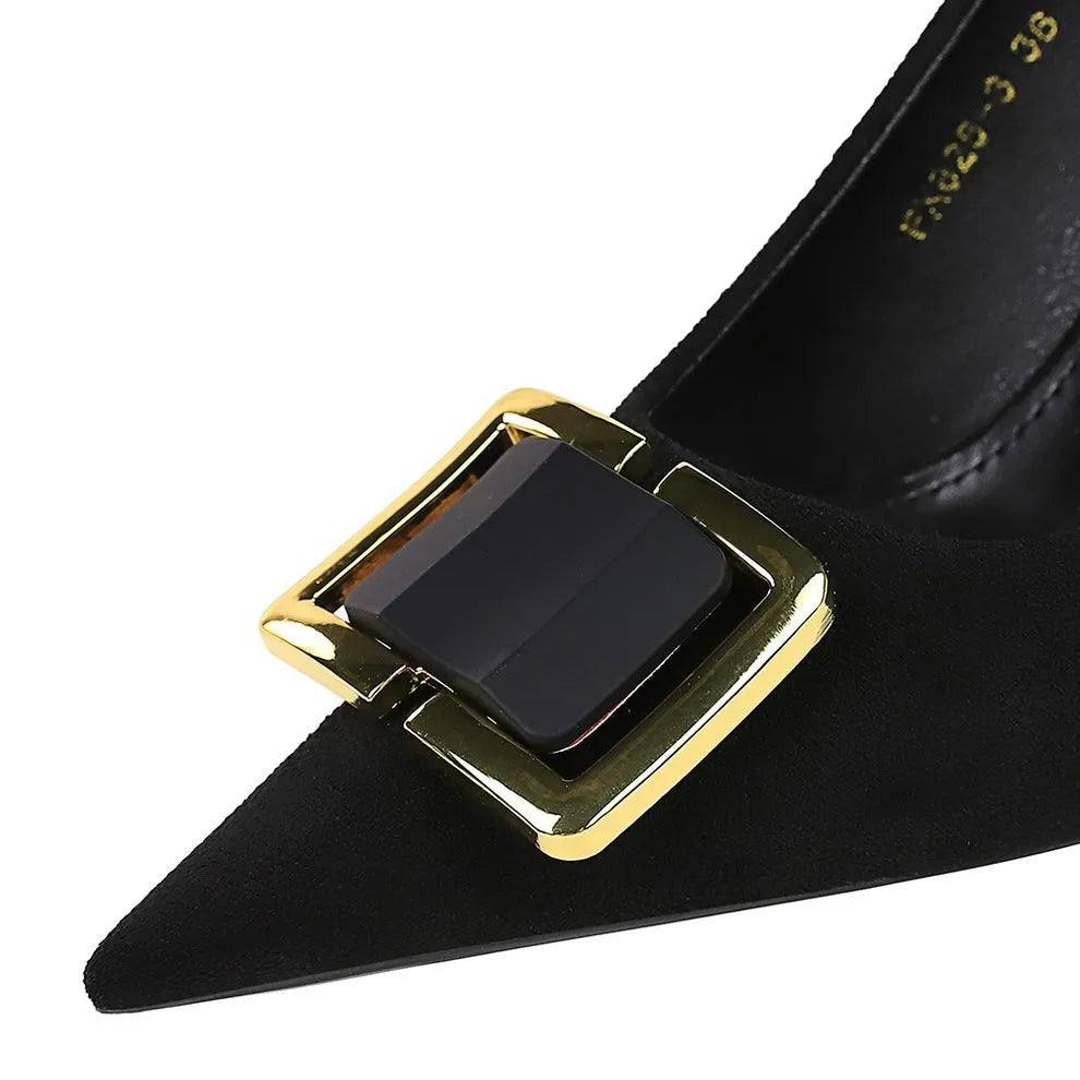 Black suede women's stiletto high heels with a 9cm heel and shallow cut, pointed toe.
