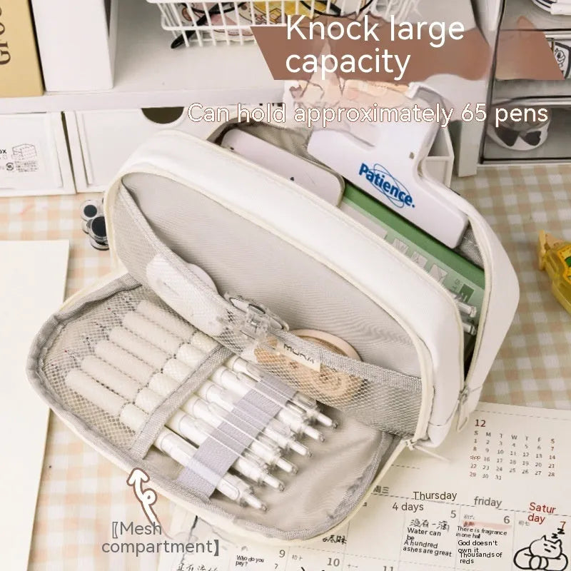 Korean-style canvas pencil case with button closure storing approximately 80 pens