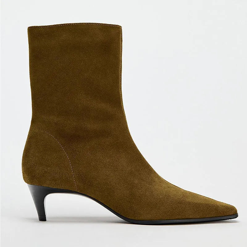 Women's brown square toe ankle boots with a stiletto heel and side zipper on a white background