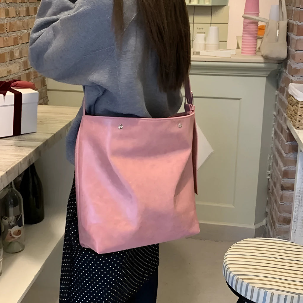 Corduroy one-shoulder commuter bag in pink or brown with PU lining, showing 39cm length dimensions