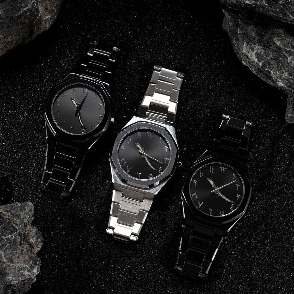 Men's silver black business watch with stainless steel belt and quartz dial.