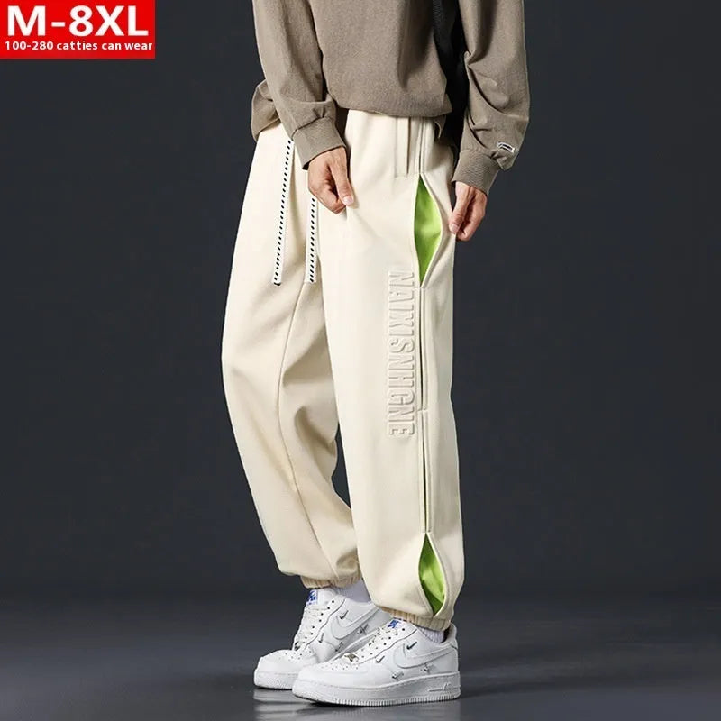 Men's cotton trousers with ankle bands and stitching detail in grey green colour