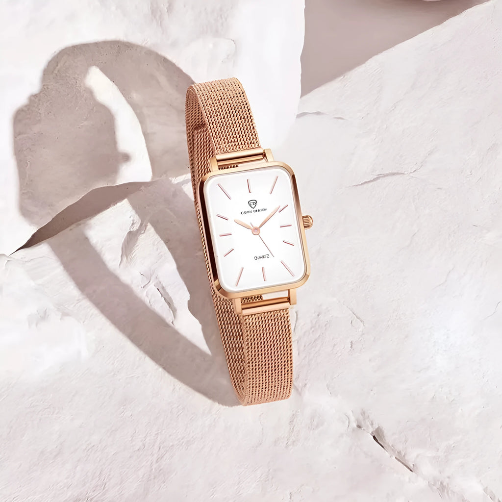 Women's waterproof quartz watch in rose gold or silver with woven steel strap and 34mm alloy case