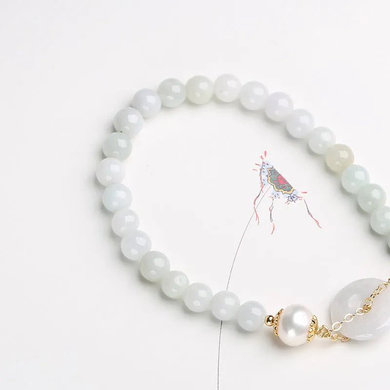 Women's natural emerald jade pearl bracelet with geometric design and traditional Chinese styling