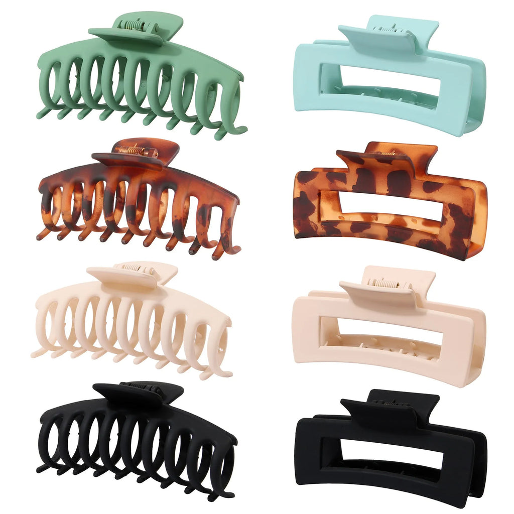 Six Rose Red plastic hair clips with a quadrilateral shape and frosted grip, laid out on a surface.