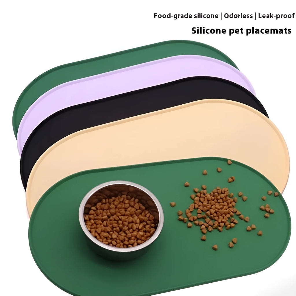 Silicone waterproof cat feeding placemat showing green colour option beneath pet food and water bowls