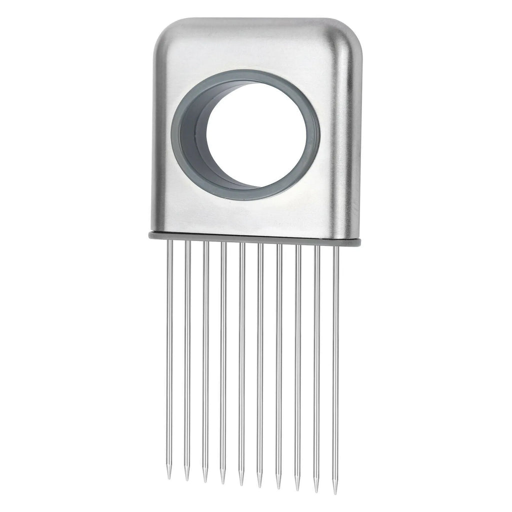 Stainless steel onion holder slicer with non-slip base on a kitchen counter, holding a tomato for slicing