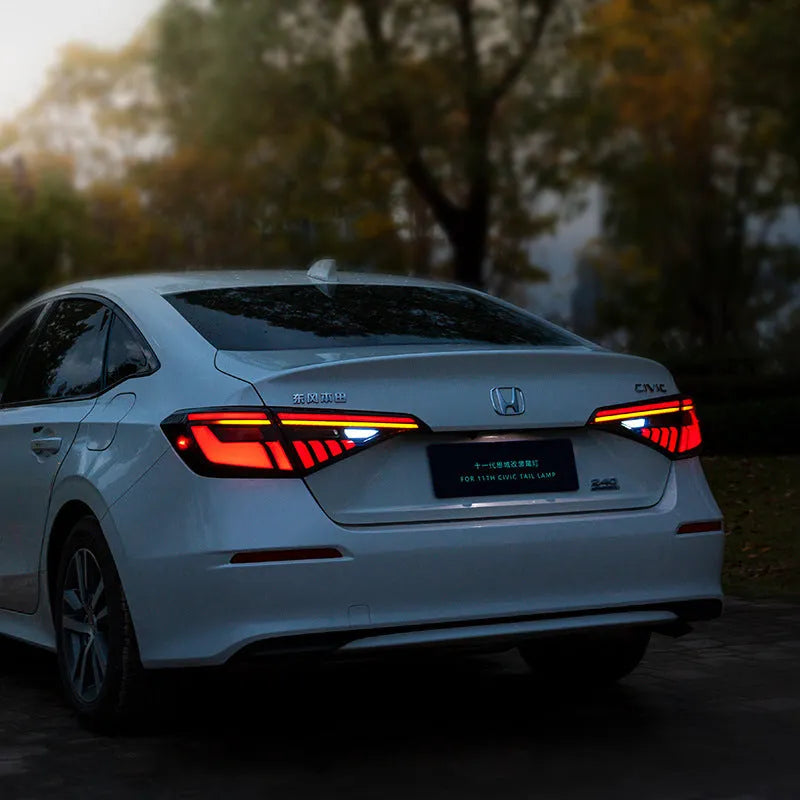 11th Generation Honda Civic black and red LED taillight assembly with streamer indicators.