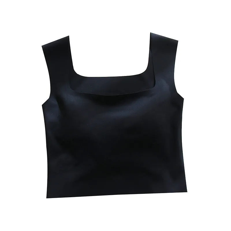 Women's non-marking sling vest in light blue, showing seamless design and abdominal length.