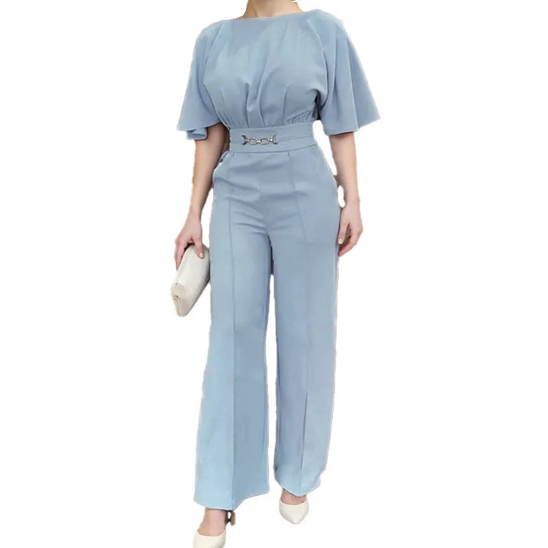 Blue men's casual polyester suit with trousers and a long-sleeve jacket on a hanger.