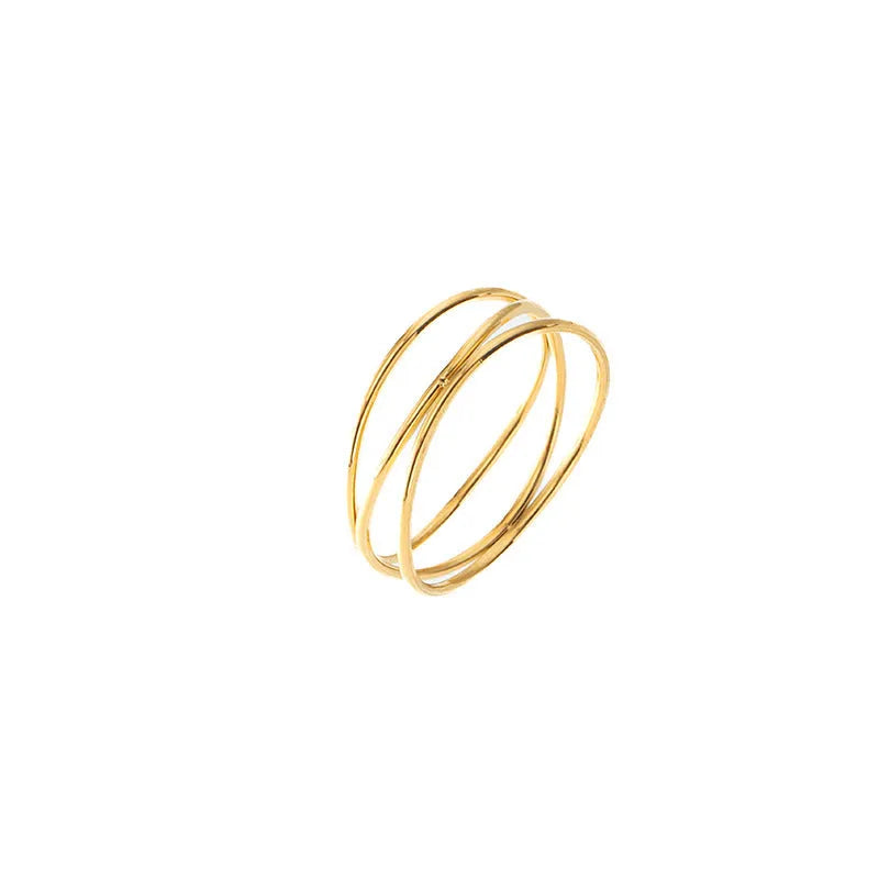 Gold titanium steel three-layer geometric line ring shown on finger, available in sizes No 5 to No 10