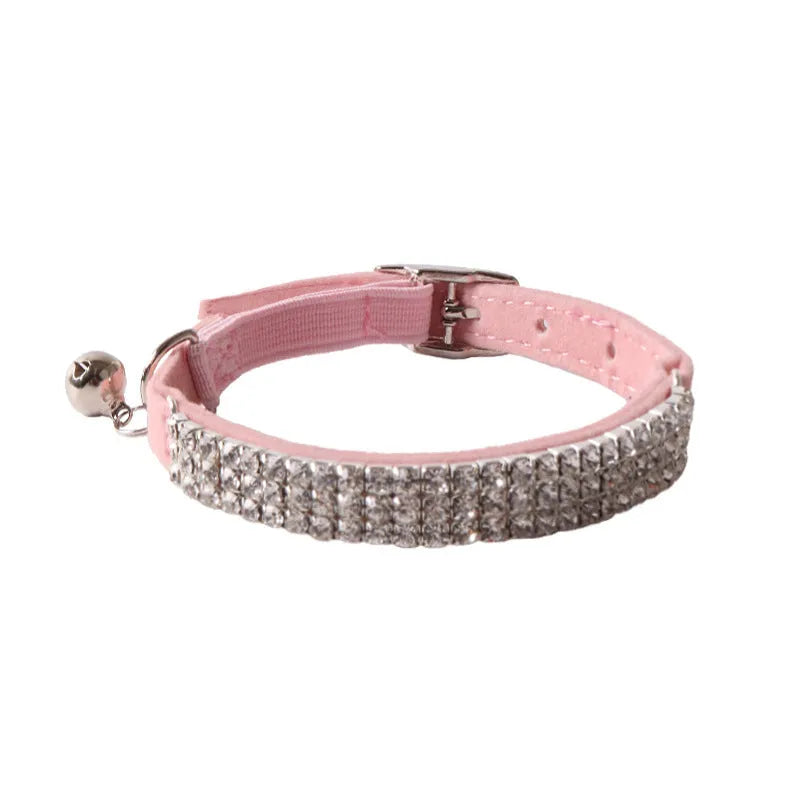 Flannel elastic buckle cat collar with gang drill decoration in assorted colours on a white background.