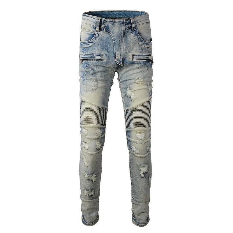 Light blue distressed slim fit men's jeans with hand-frayed details and straight leg opening
