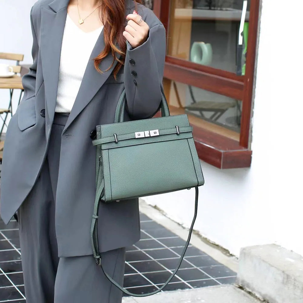 Genuine leather small square shoulder bag in almond green with internal organisation compartments