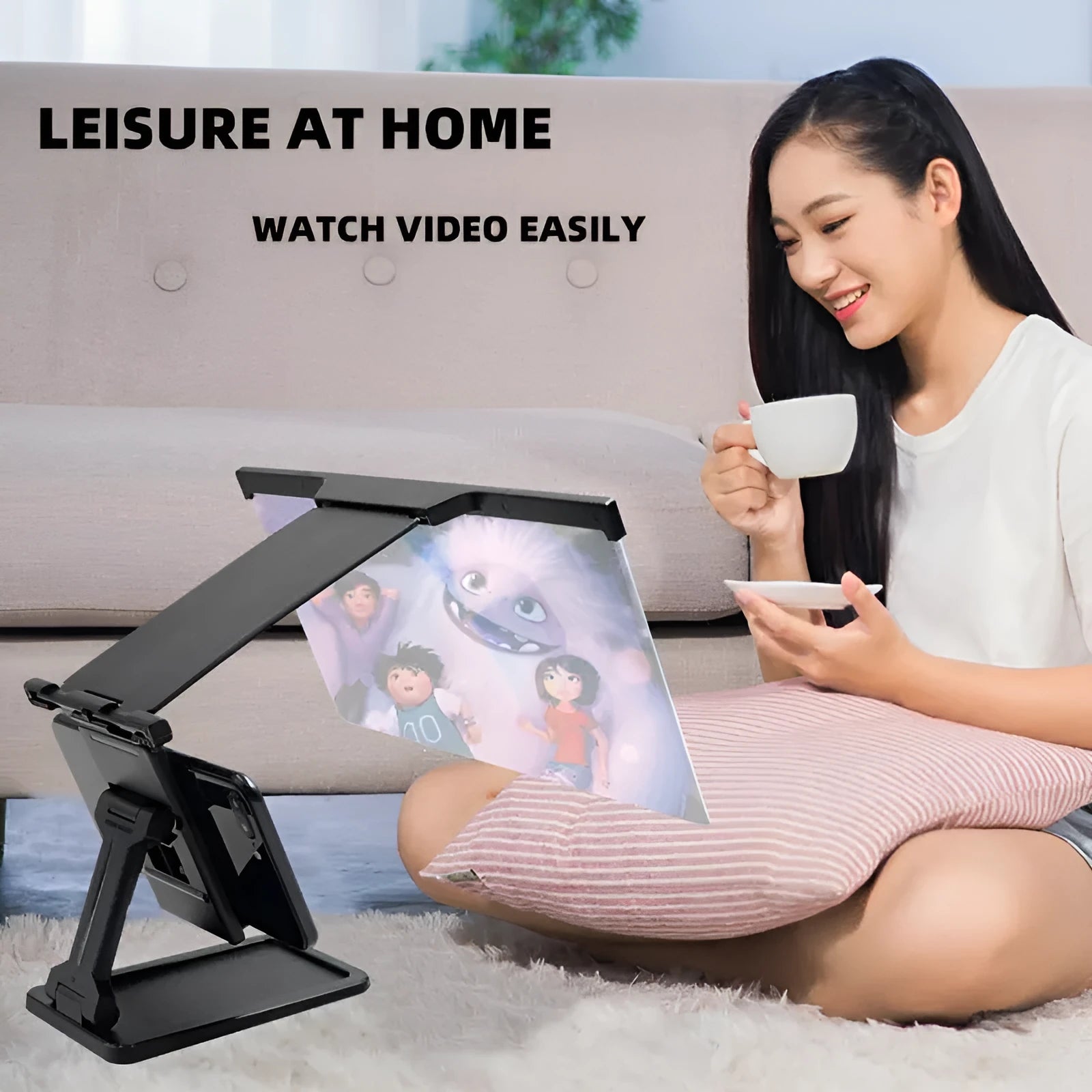 Black 12 inch mobile phone screen amplifier with detachable folding phone holder on desktop
