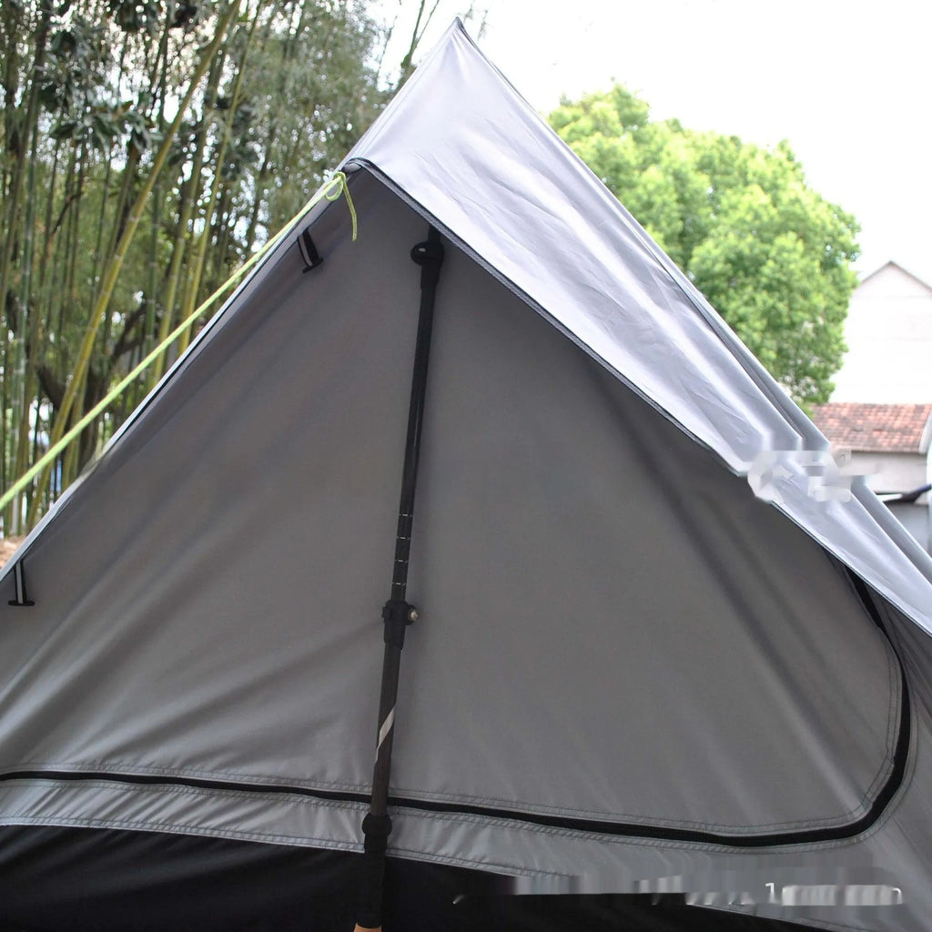Brown A-line trekking tent pitched using hiking poles with dimensions 210x150x110cm