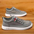 Casual men's high-top sneakers with PU leather upper and PVC sole in black, gray, and green
