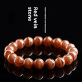 Natural Peruvian rhodochrosite bead bracelet with geometric design and ruyi element