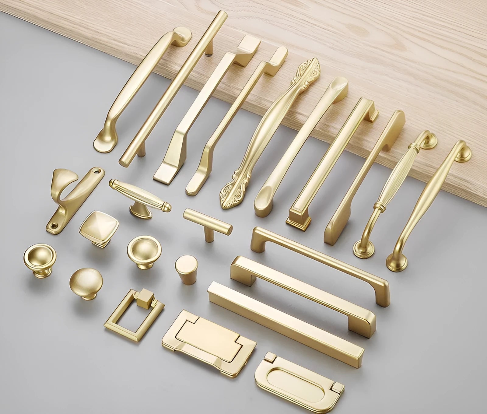 Gold aluminium alloy cabinet handle with T shape design showing single mounting hole
