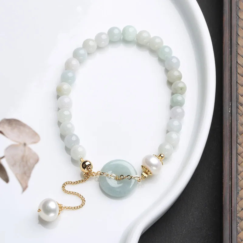 Women's natural emerald jade pearl bracelet with geometric design and traditional Chinese styling