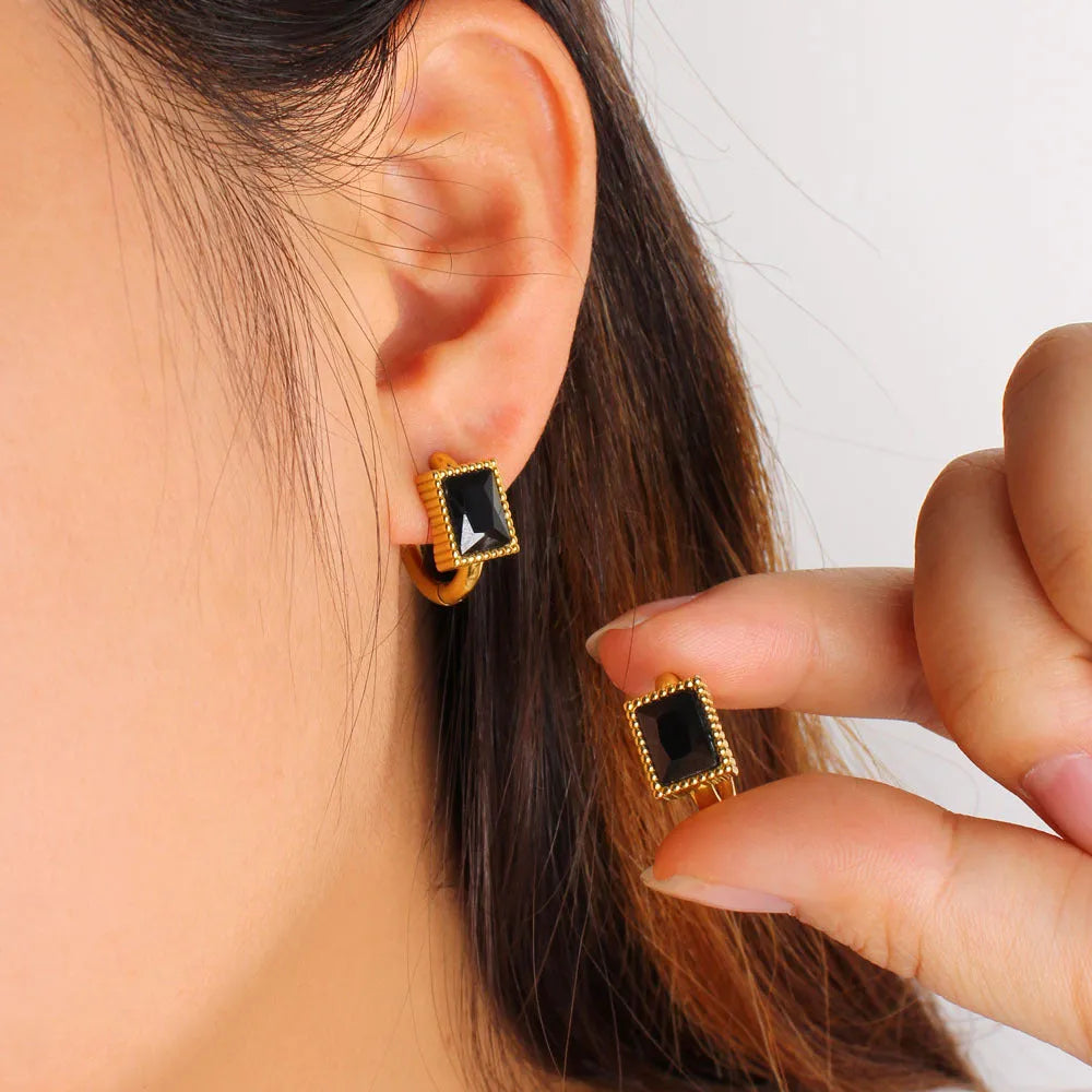 Square zircon stainless steel earrings with geometric design and round ring elements in white, black, or green colours