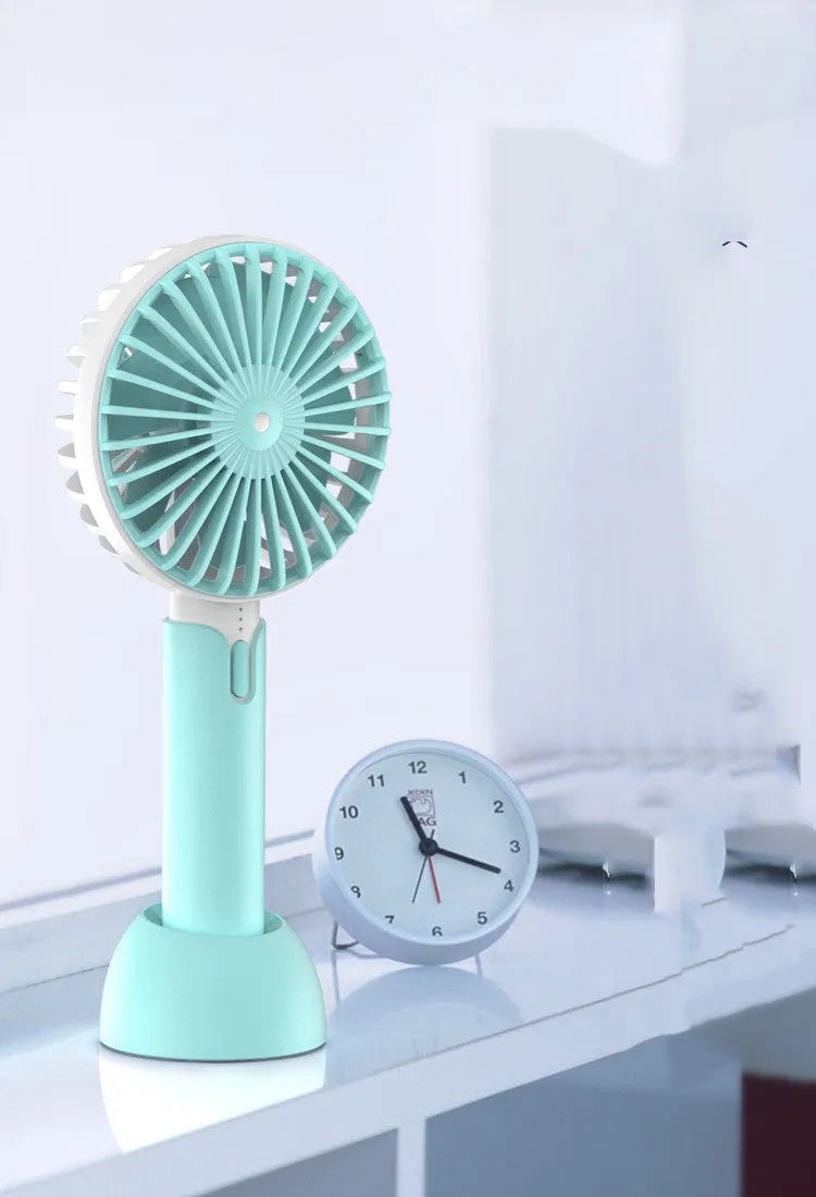 Blue handheld mini desktop USB electric fan with three speed settings and quiet operation