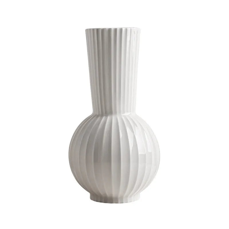 White ceramic ball vase with stripes, American country style, shown on a table.