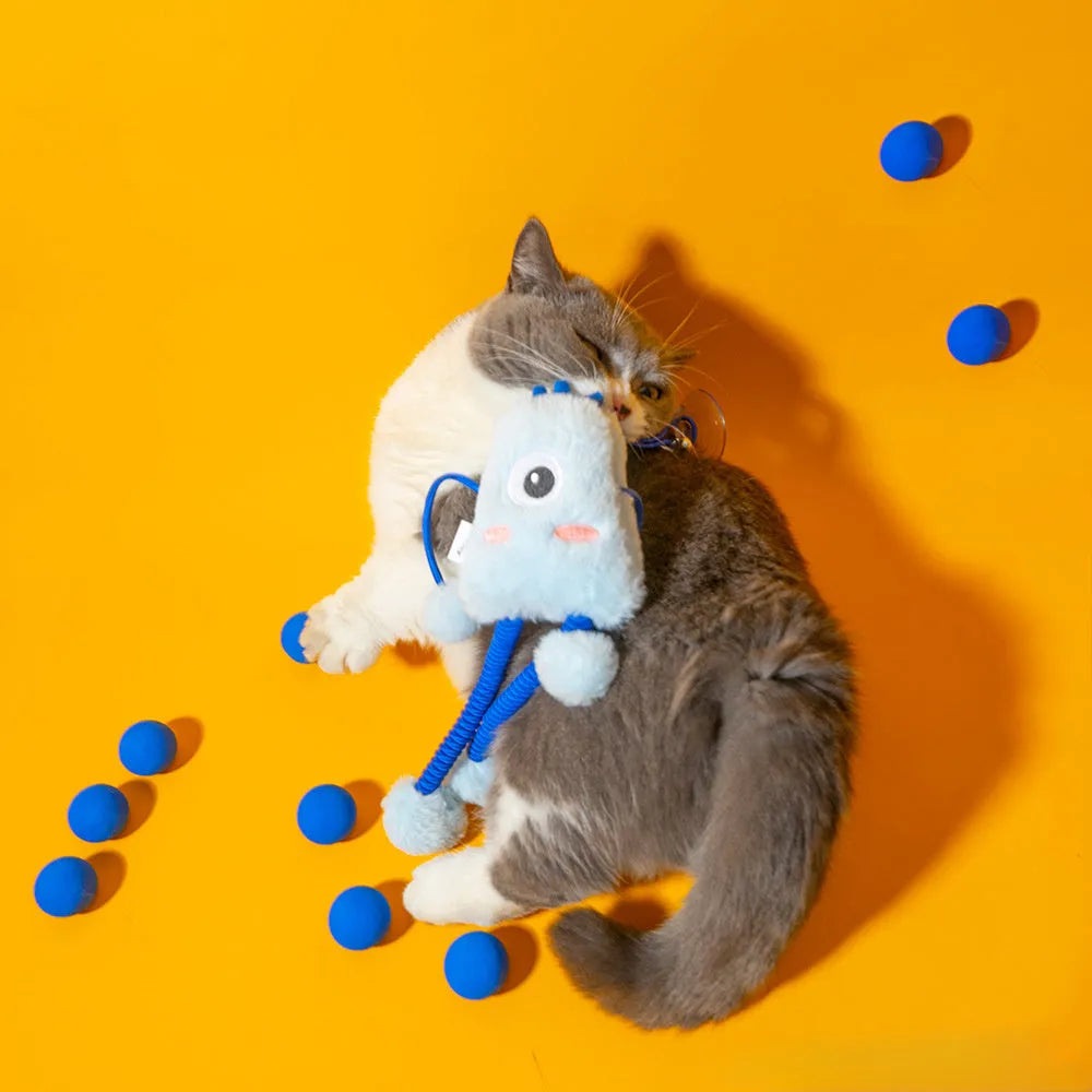 Blue plush cat toy with telescopic elastic rope, ring with bell and mint element on white background