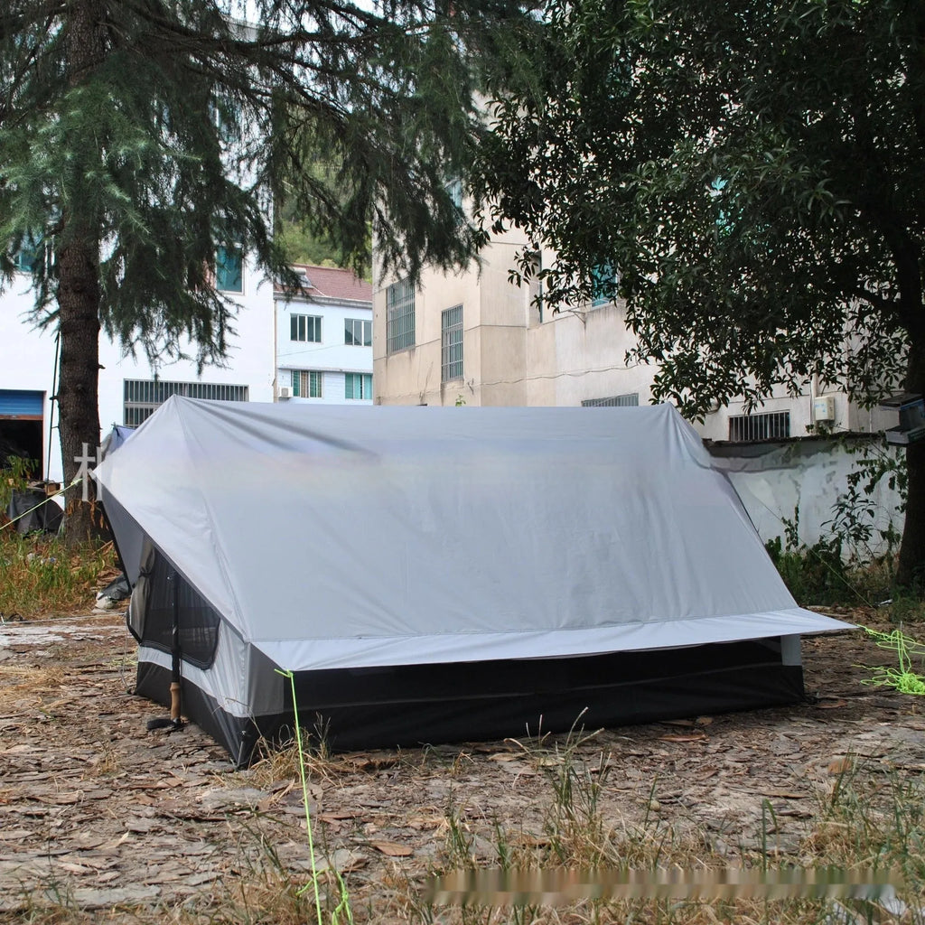 Brown A-line trekking tent pitched using hiking poles with dimensions 210x150x110cm