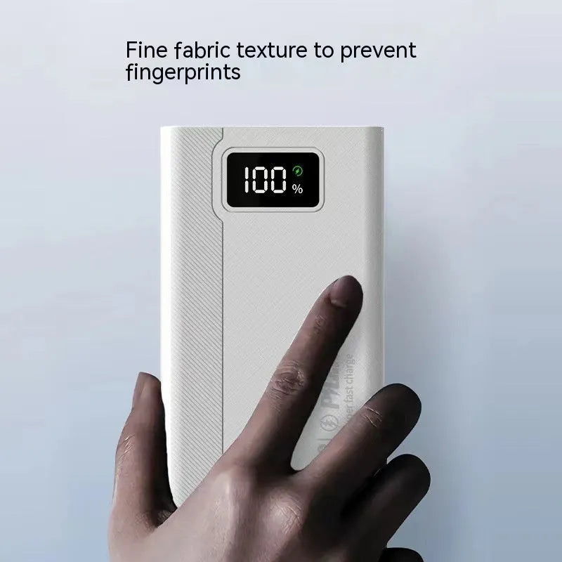 Black and white large capacity fast charging power bank with dimensions 150x76mm
