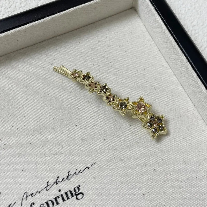 Gold alloy rhinestone barrette clip with five-pointed star and single word design for side bangs