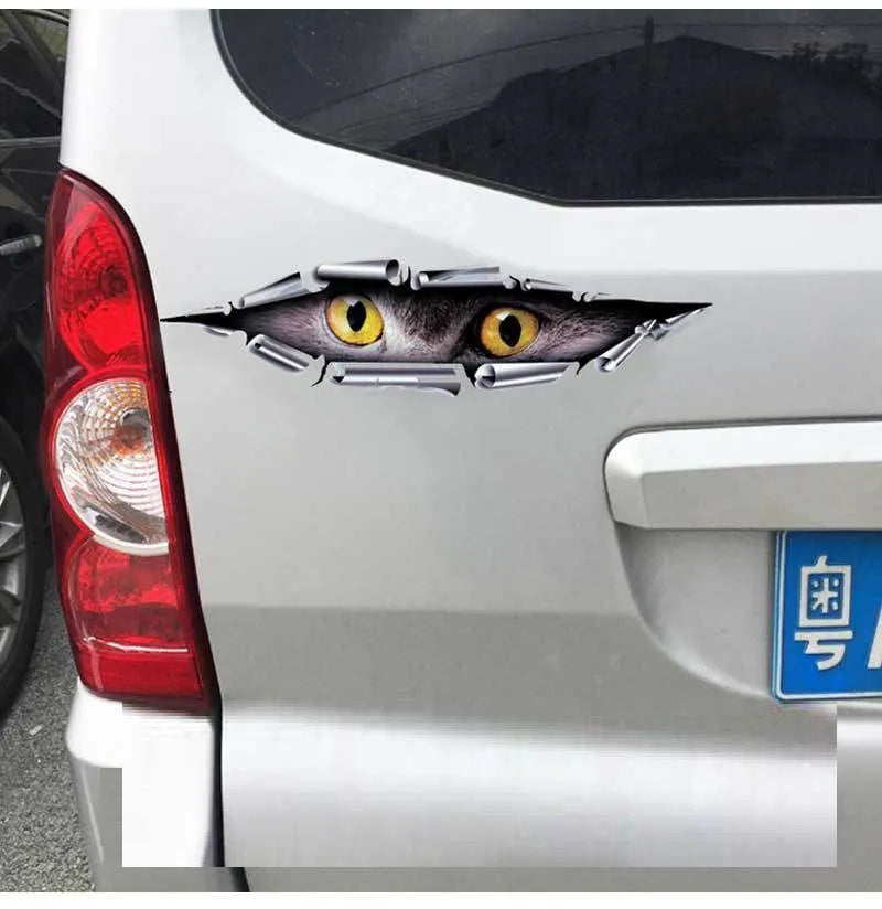 3D Tiger Eye and Eagle Eye pattern car bumper stickers measuring 10x35cm on vehicle door